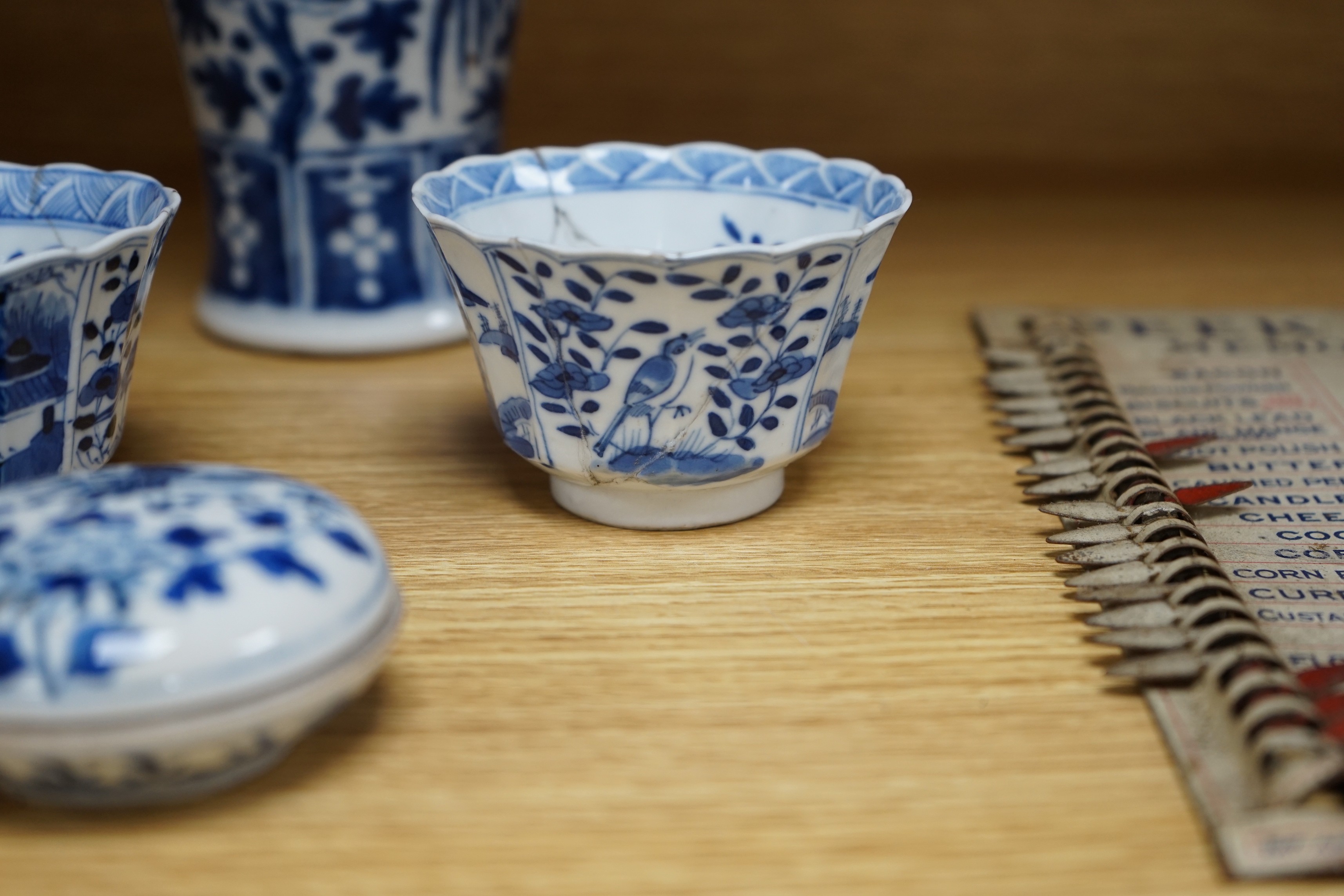 A Chinese blue and white phoenix decorated vase, a pair of circular boxes and a pair of damaged tea bowls. Late 19th century Tallest 17.5cm